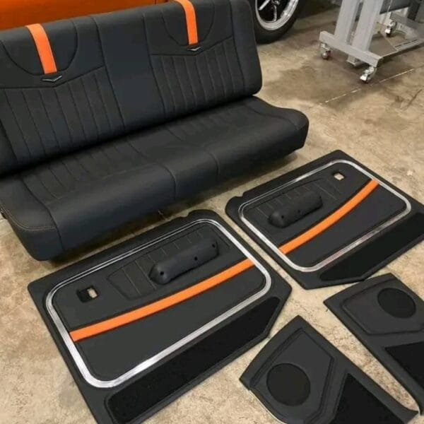 69 F100 Custom bench seat Custom doors Custom kick panels 6.5s cut out Custom Relicate German weave carpet CUSTOM UPHOLSTERY DESIGNER