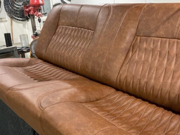 C10 interior “kit” . Custom shaped foam on a stock seat frame, stock door panels and dash pad all covered in relicate leather amber glow distressed leather. - Image 4